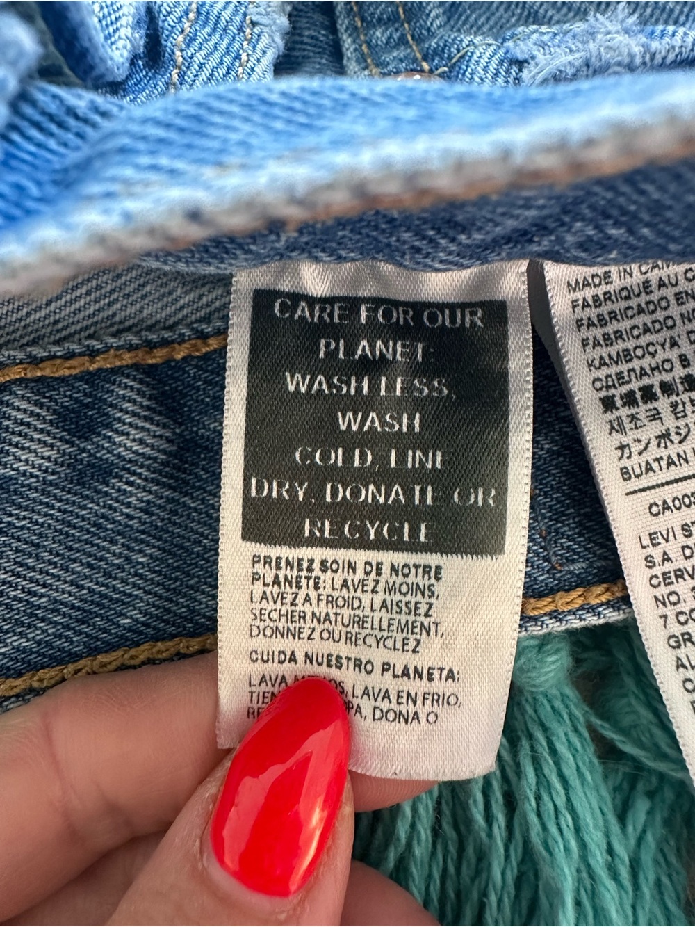 Levi's Distressed Light Blue High-Rise Jean Shorts - Picture 5 of 6